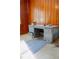 Office showcasing wood paneling and a classic metal desk at 126 W North St, Tampa, FL 33604