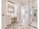 Bathroom with double vanity and walk in shower at 2073 Treasure Ln, Punta Gorda, FL 33982