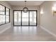 Bright dining room with sliding glass doors and view of patio at 2073 Treasure Ln, Punta Gorda, FL 33982