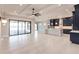 Modern kitchen with navy blue cabinets and island at 2073 Treasure Ln, Punta Gorda, FL 33982