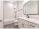 Clean bathroom with white subway tile and a modern vanity at 2073 Treasure Ln, Punta Gorda, FL 33982