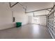 Spacious garage with epoxy flooring and overhead storage at 2073 Treasure Ln, Punta Gorda, FL 33982