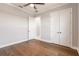 Bedroom with hardwood floors and double door closet at 2073 Treasure Ln, Punta Gorda, FL 33982