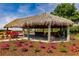 Relaxing outdoor palapa with seating and bar area at 2073 Treasure Ln, Punta Gorda, FL 33982