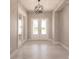 Bright and spacious entryway with elegant tile flooring at 2073 Treasure Ln, Punta Gorda, FL 33982