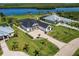 Waterfront property with modern home, pool, and lush landscaping at 2073 Treasure Ln, Punta Gorda, FL 33982