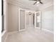 Private office with glass French doors and tile floors at 2073 Treasure Ln, Punta Gorda, FL 33982