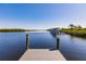 Private dock extending into the water at 2073 Treasure Ln, Punta Gorda, FL 33982