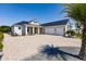 Modern farmhouse home with two-car garage and landscaping at 2073 Treasure Ln, Punta Gorda, FL 33982