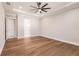 Bedroom with hardwood floors and access to bathroom at 2073 Treasure Ln, Punta Gorda, FL 33982