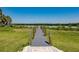 Private dock extending to the waterfront at 2073 Treasure Ln, Punta Gorda, FL 33982