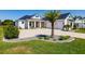 Modern farmhouse home with driveway and landscaping at 2073 Treasure Ln, Punta Gorda, FL 33982