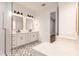 Bathroom with double vanity and walk in shower at 2073 Treasure Ln, Punta Gorda, FL 33982