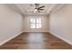 Spacious bedroom with hardwood floors and large window at 2073 Treasure Ln, Punta Gorda, FL 33982