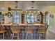 Kitchen with island, granite countertops, and wood cabinets at 48665 Bermont Rd, Punta Gorda, FL 33982