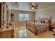 Bedroom with hardwood floors and a queen-size bed at 48665 Bermont Rd, Punta Gorda, FL 33982