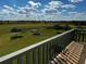 Serene backyard view with a firepit and open space at 48665 Bermont Rd, Punta Gorda, FL 33982