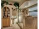 Bathroom with walk-in shower and pedestal sink at 48665 Bermont Rd, Punta Gorda, FL 33982
