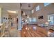 Open concept living area with hardwood floors and high ceilings at 48665 Bermont Rd, Punta Gorda, FL 33982