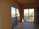 Spacious balcony boasting serene lake and community views at 97 Vivante Blvd # 9749, Punta Gorda, FL 33950