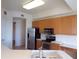 Kitchen with stainless steel appliances and a double sink at 97 Vivante Blvd # 9749, Punta Gorda, FL 33950