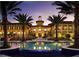Resort-style pool and clubhouse at night at 97 Vivante Blvd # 9749, Punta Gorda, FL 33950