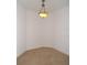 Bright dining room with carpeted floor and a chandelier at 97 Vivante Blvd # 9749, Punta Gorda, FL 33950