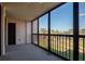 Enclosed balcony boasts views of the green landscape below and has access to a doorway at 3006 Caring Way # 325, Port Charlotte, FL 33952