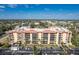 A tall condo building offers many units with large windows, ample parking and many nearby amenities at 3006 Caring Way # 325, Port Charlotte, FL 33952