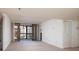 Spacious living room featuring natural light and access to the balcony at 3006 Caring Way # 325, Port Charlotte, FL 33952