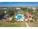 Enjoy the community pool and tennis courts surrounded by lush landscaping and community recreation area at 3006 Caring Way # 325, Port Charlotte, FL 33952