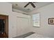 Bedroom with double bed, closet, and window with blinds at 7417 S Moss Rose, Punta Gorda, FL 33955