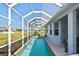 Enclosed rectangular pool with screened enclosure at 7417 S Moss Rose, Punta Gorda, FL 33955