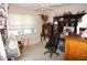 Home office features built-in shelving and desk at 25100 Sandhill Blvd # Y201, Punta Gorda, FL 33983