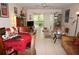 Bright living room and dining area with tiled floors at 25100 Sandhill Blvd # Y201, Punta Gorda, FL 33983