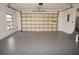 Clean and bright garage featuring an overhead door at 525 Medici Ct, Punta Gorda, FL 33950