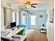 Home office with a workspace, rug and mini-fridge at 3106 Harbor Blvd # 3A, Port Charlotte, FL 33952