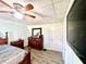 Spacious bedroom with wood-look floors and built-in dresser at 3106 Harbor Blvd # 3A, Port Charlotte, FL 33952