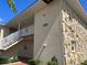 Exterior view of building with stone and stairs at 3106 Harbor Blvd # 3A, Port Charlotte, FL 33952