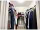 Large walk-in closet with ample shelving and hanging space at 3106 Harbor Blvd # 3A, Port Charlotte, FL 33952