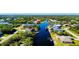 Wide aerial view of waterfront homes and community at 13654 Allamanda Cir, Port Charlotte, FL 33981