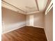 Spacious bedroom with light walls, wood flooring, and a ceiling fan at 13654 Allamanda Cir, Port Charlotte, FL 33981