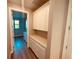 Bright hallway with white cabinets and built in shelves at 13654 Allamanda Cir, Port Charlotte, FL 33981