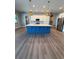 Bright kitchen featuring a center island, stainless steel appliances, and recessed lighting at 13654 Allamanda Cir, Port Charlotte, FL 33981