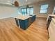 Stylish kitchen island with stainless steel appliances and views of the backyard through large sliding doors at 13654 Allamanda Cir, Port Charlotte, FL 33981