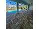 Inviting pool area with a screened enclosure and large patio at 13654 Allamanda Cir, Port Charlotte, FL 33981