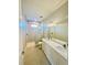 Modern bathroom with double vanity and walk-in shower at 13654 Allamanda Cir, Port Charlotte, FL 33981