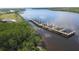 Stunning view of community's private docks extending over calm waters at 28944 Gin Ln, Punta Gorda, FL 33982