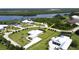 Aerial view of waterfront lot with neighboring houses visible at 28944 Gin Ln, Punta Gorda, FL 33982