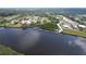 Community overview showcasing waterfront property with private boat docks and lush landscape at 28944 Gin Ln, Punta Gorda, FL 33982